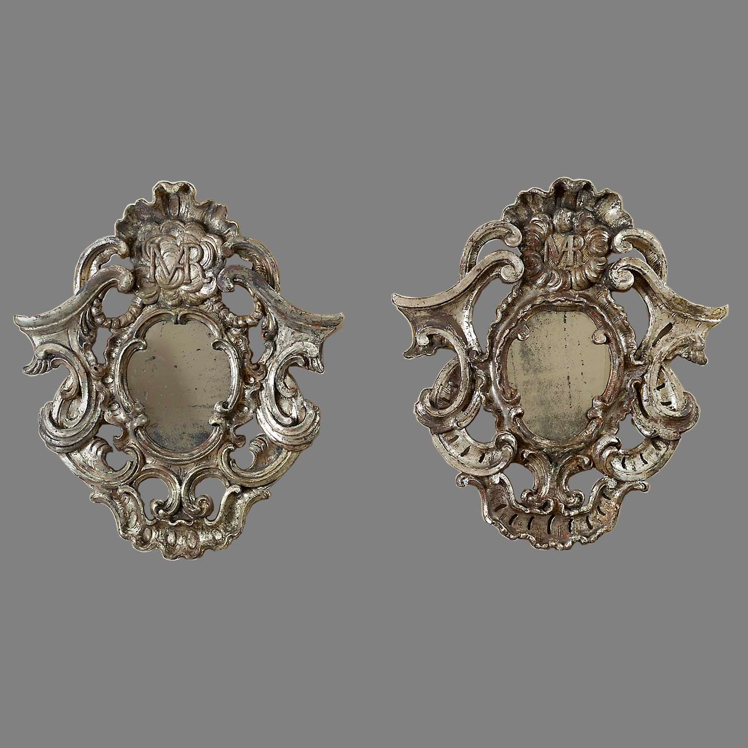 Pair of Baroque Silver Gilt Mirrors